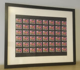 I'm All Stamped Up! Elvis Presley 29c USA stamps x 48 in black frame.